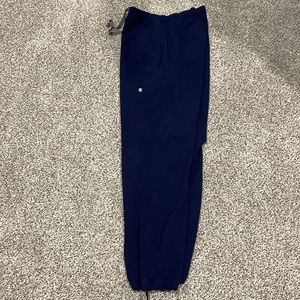 Figs cargo scrubs with drawstring bottom.